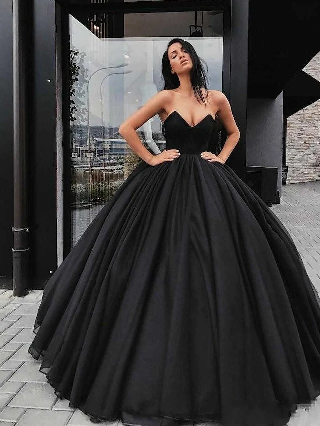 Black ball gown wedding dress with sweetheart neckline and modern draping.