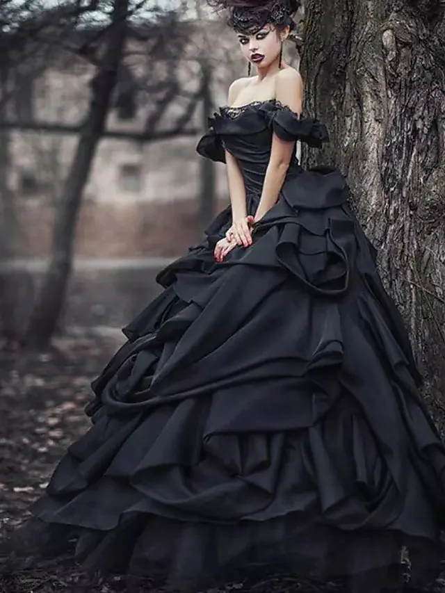 Black off-shoulder short sleeve lace tulle ball gown wedding dress.