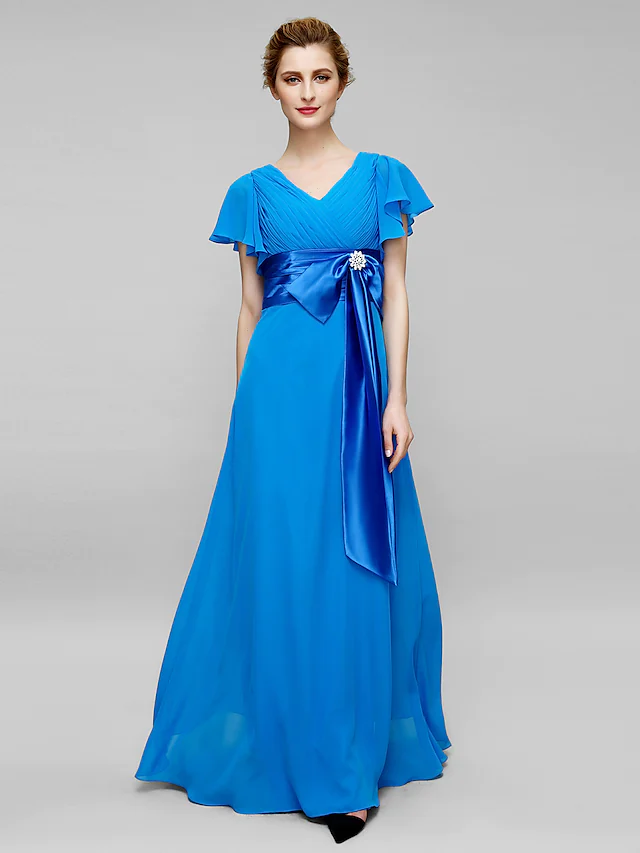 Blue chiffon formal gown with elegant V-neck design.