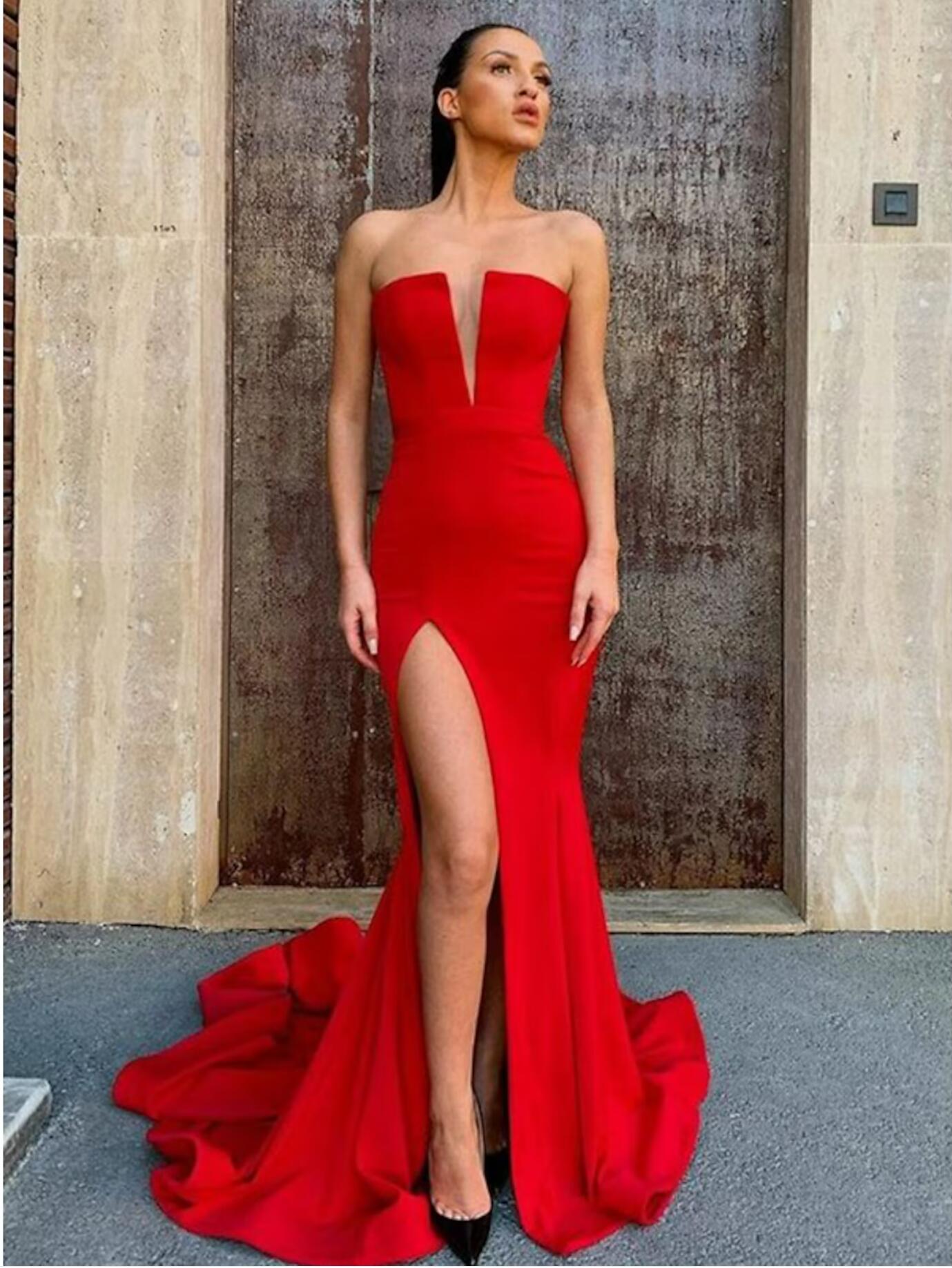 Elegant strapless charmeuse prom dress with open back and court train.