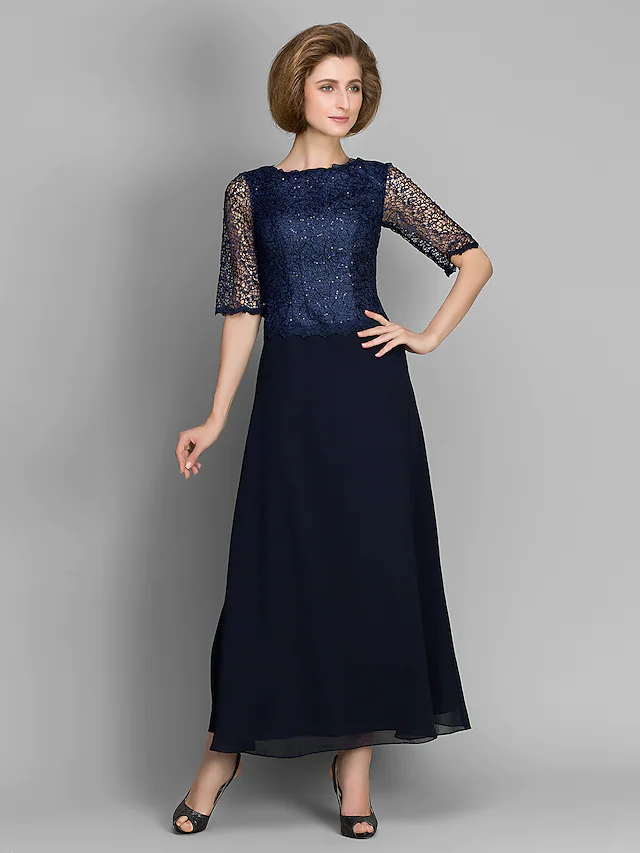 Back view of the navy Mother of the Bride gown, showing lace details.