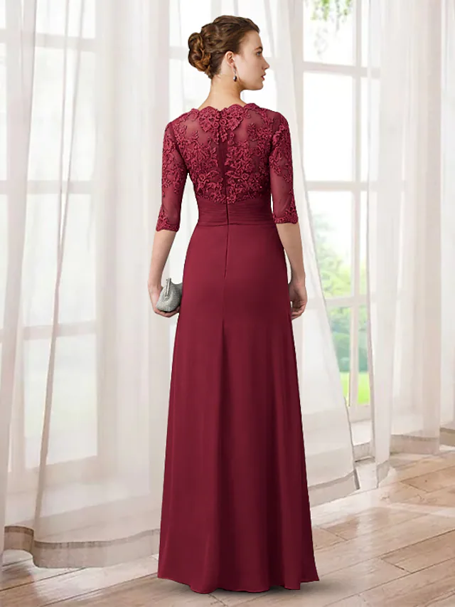 Back view of the elegant chiffon lace Mother of the Bride dress, showing floor-length design.