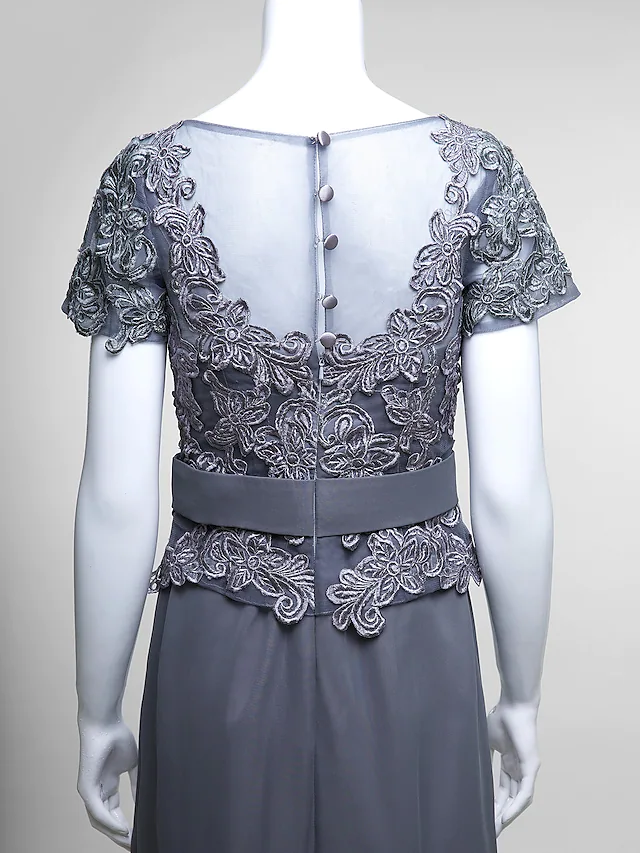 Full view of the sophisticated Mother of the Bride dress, showcasing its flowing chiffon skirt.