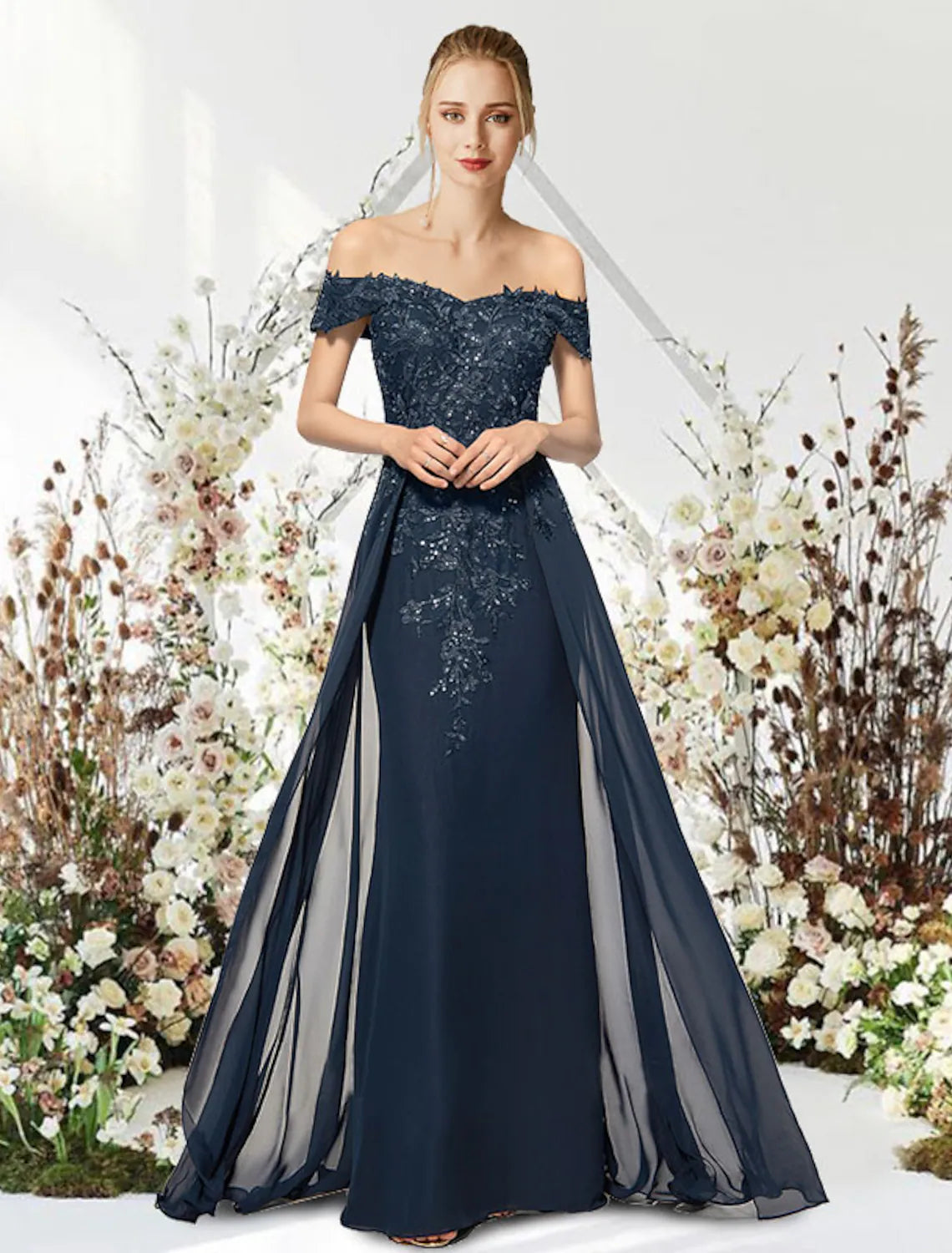 Elegant chiffon mermaid trumpet gown with off-shoulder neckline and intricate beading.