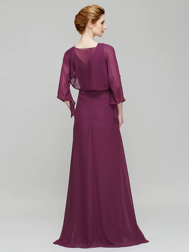 Back view of floor-length chiffon gown with criss-cross crystal details.