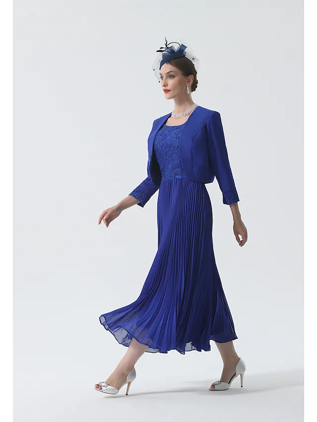 Back view of the tea length chiffon Mother of the Bride dress.