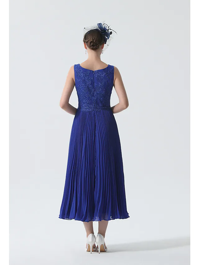 Side profile of the two-piece elegant Mother of the Bride dress.