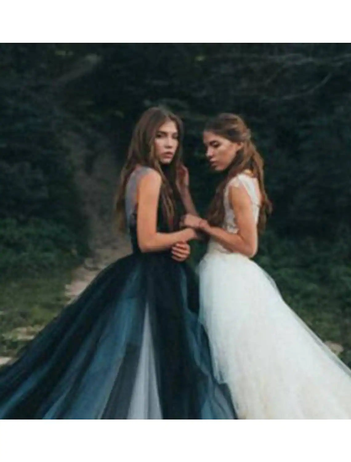 Close-up of tulle fabric, pleats, and appliques on the ball gown.