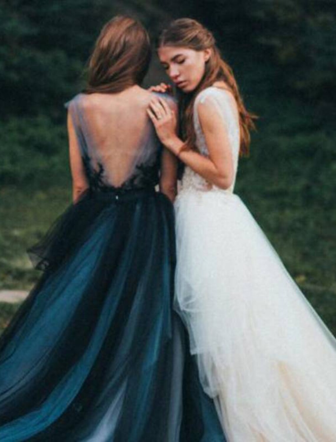 Side profile of the sleeveless color block evening gown.