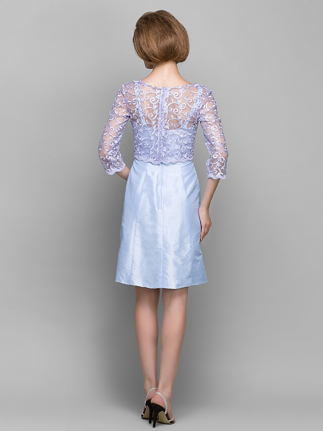 Back view of the convertible sheath dress, showcasing the lace sleeves.