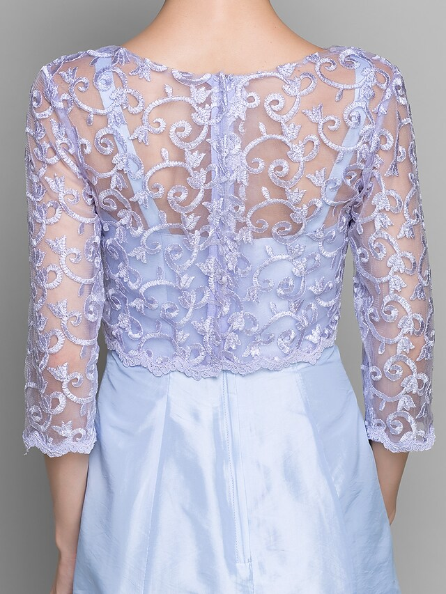 Full view of the elegant knee-length formal dress.
