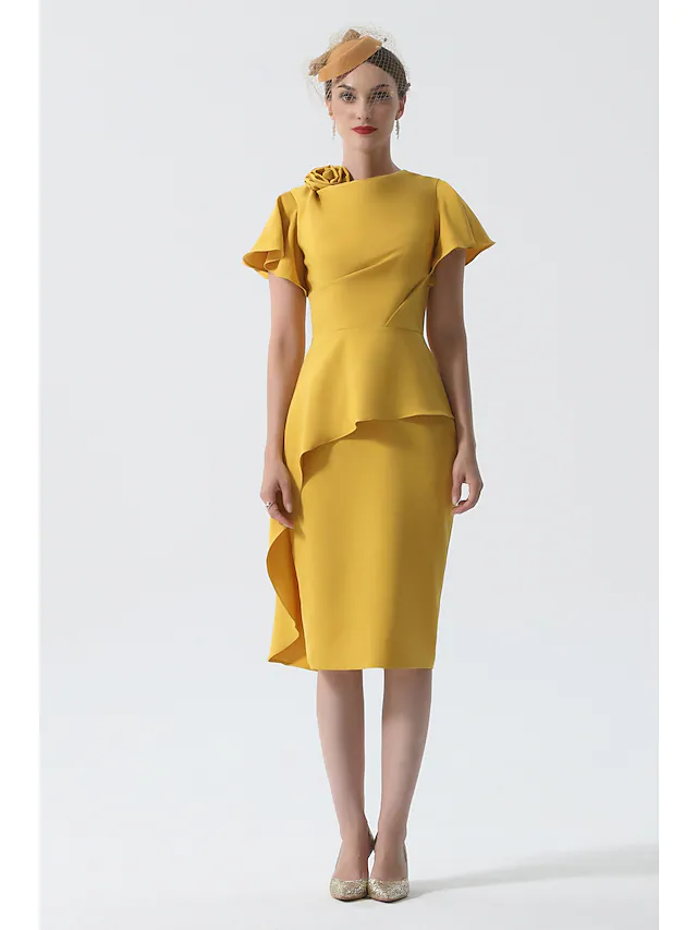 Side profile of the elegant cowl neck dress.