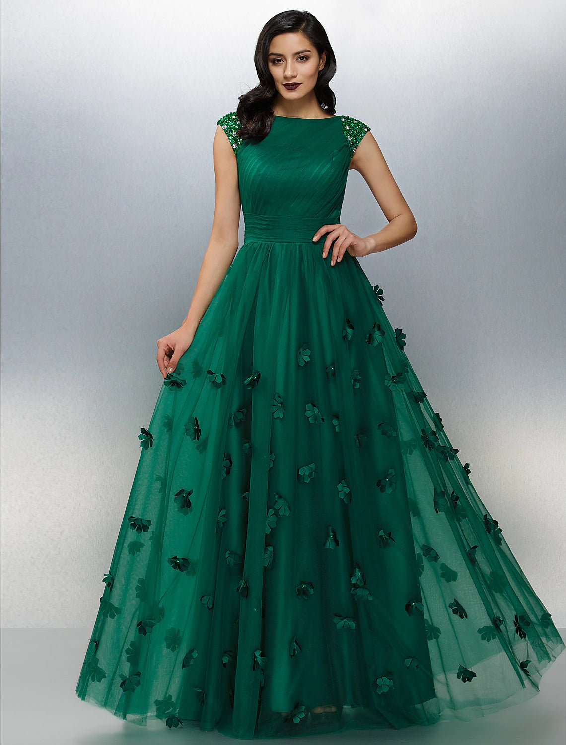 Elegant A-Line floral dress with crystal appliques, front view.