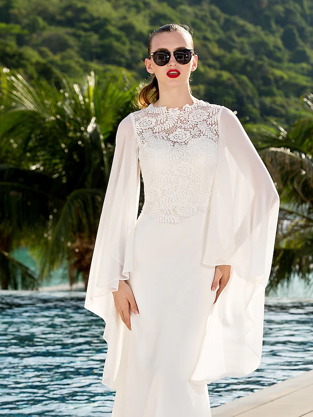Close-up of the lace and illusion details on the wedding dress.
