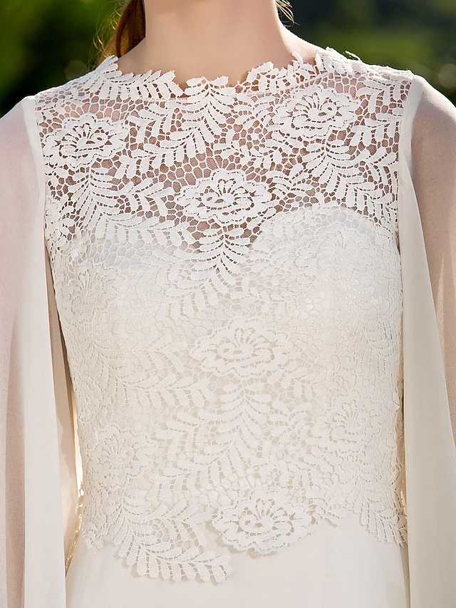 Detail of the jewel neckline and sleeve cuff.