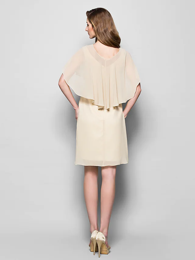 Back view of Georgette Mother of the Bride dress with knee length hem.