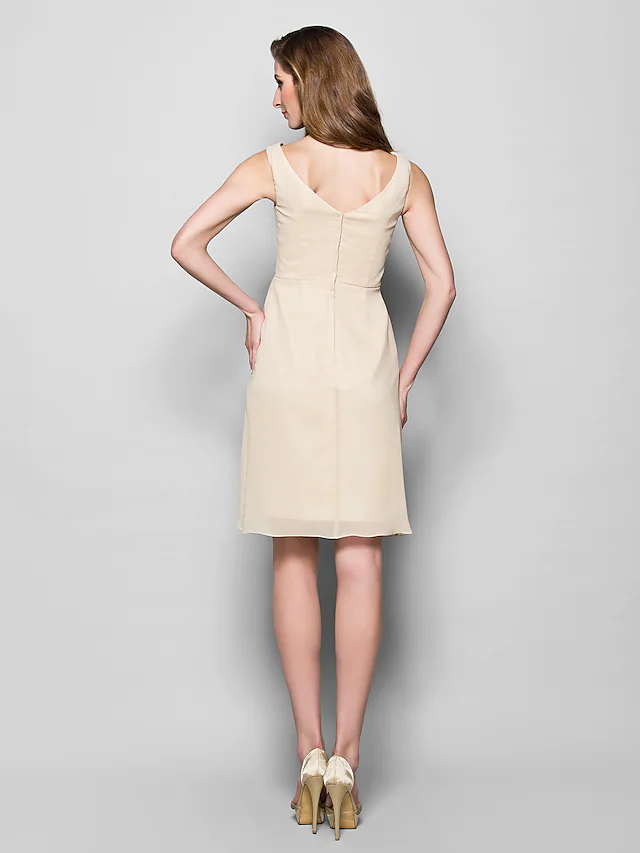 Close-up of bateau neckline and half sleeve on Georgette dress.