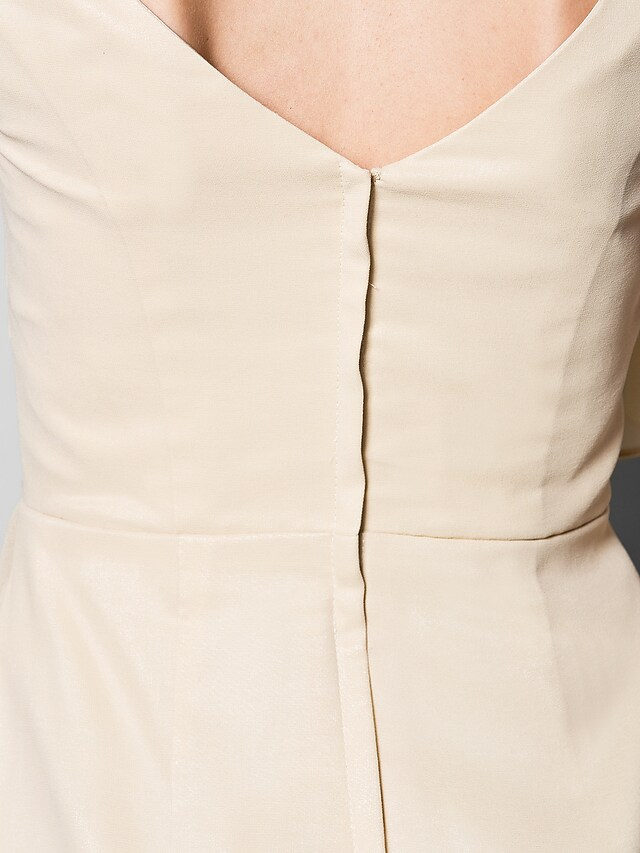 Detail of georgette fabric and dress silhouette.