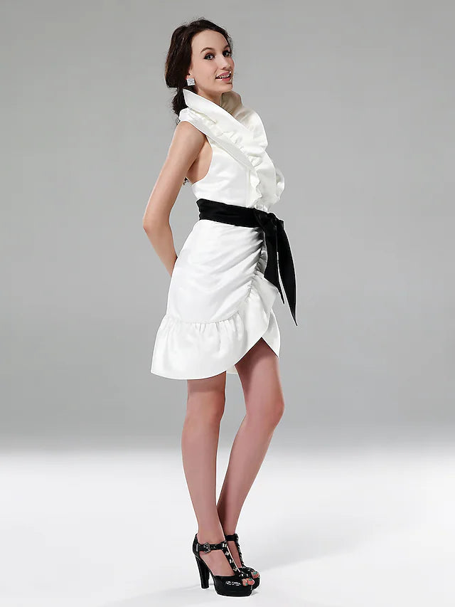 Back view of a blush halter sheath mini dress, showing the halter neck and ruffles.