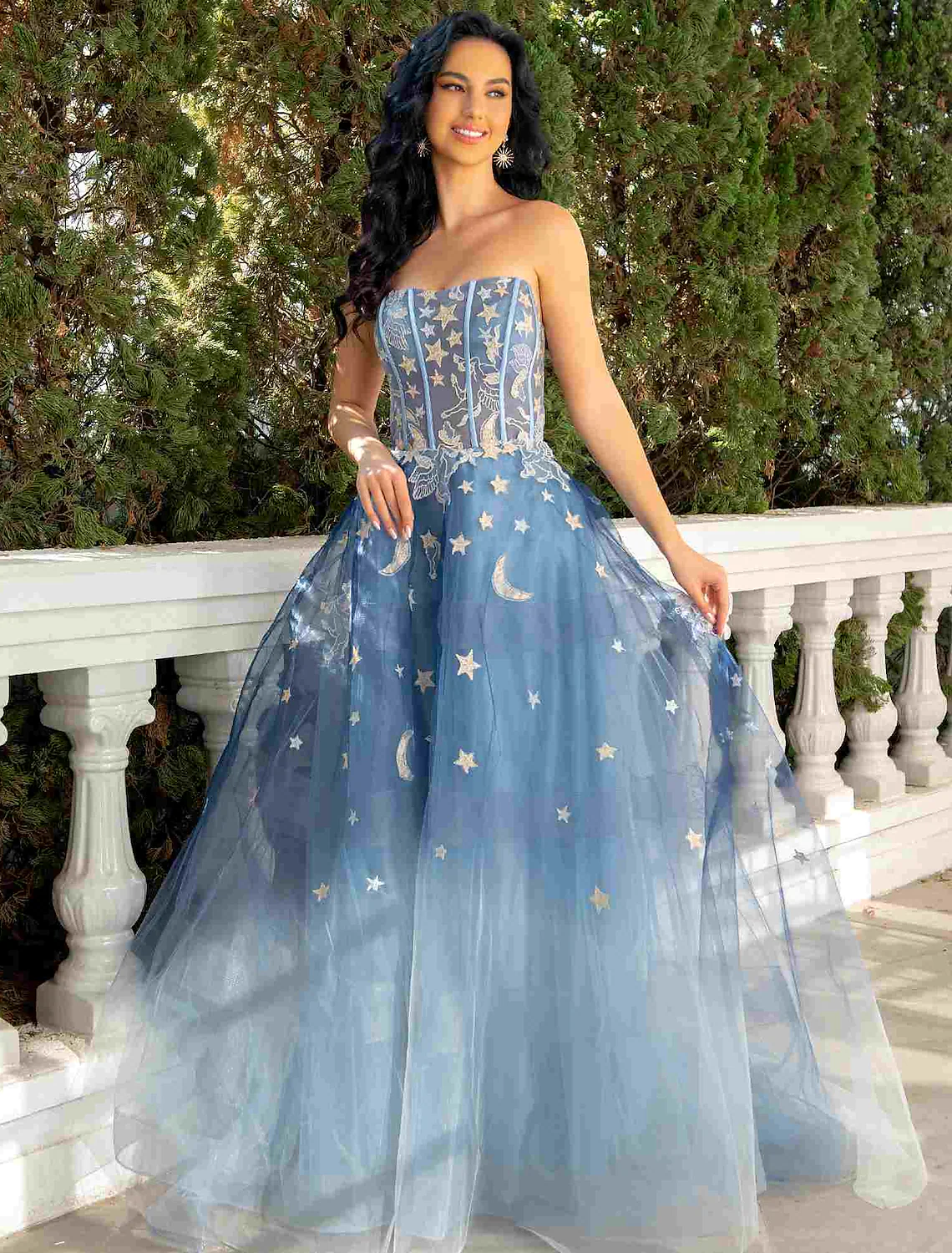 Elegant ivory strapless ball gown with lace and sequin appliques.