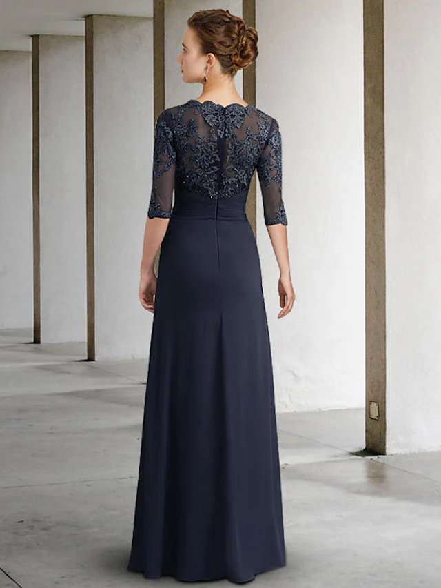 Back view of the elegant light blue Mother of the Bride dress, showcasing its floor-length design.