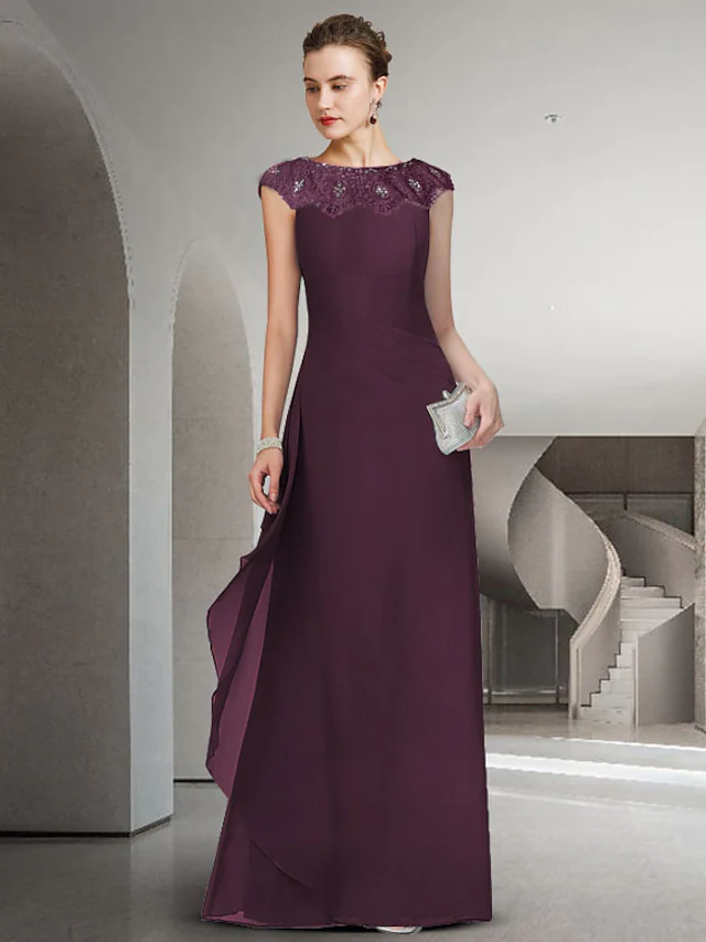 Elegant floor-length Mother of the Bride dress with jewel neck, chiffon, lace, and ruffles.