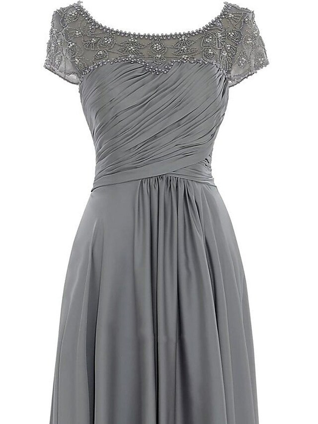 Back view of the floor-length chiffon mother of the bride dress, showing pleats.