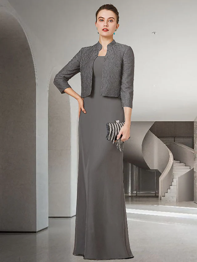 Elegant Mother of the Bride dress with jewel neck, half sleeves, chiffon lace, and appliques.