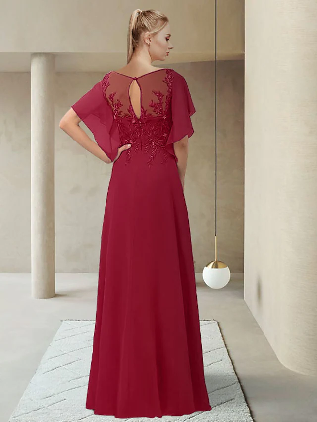 Close-up of the chiffon lace and applique details on the Mother of the Bride dress.