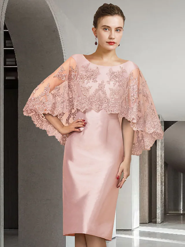 Elegant Mother of the Bride dress with jewel neck, half sleeves, lace, and satin fabric.