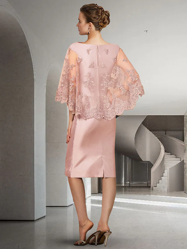 Back view of the elegant Mother of the Bride dress, showcasing lace and applique details.