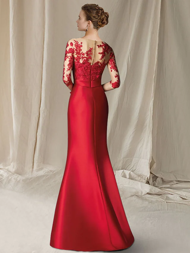 Side view of the elegant lace and satin mermaid dress.