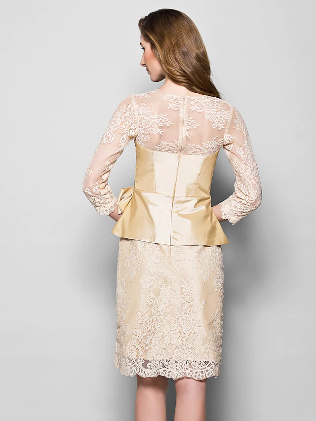 Close-up of the lace and taffeta fabric on the Mother of the Bride dress.