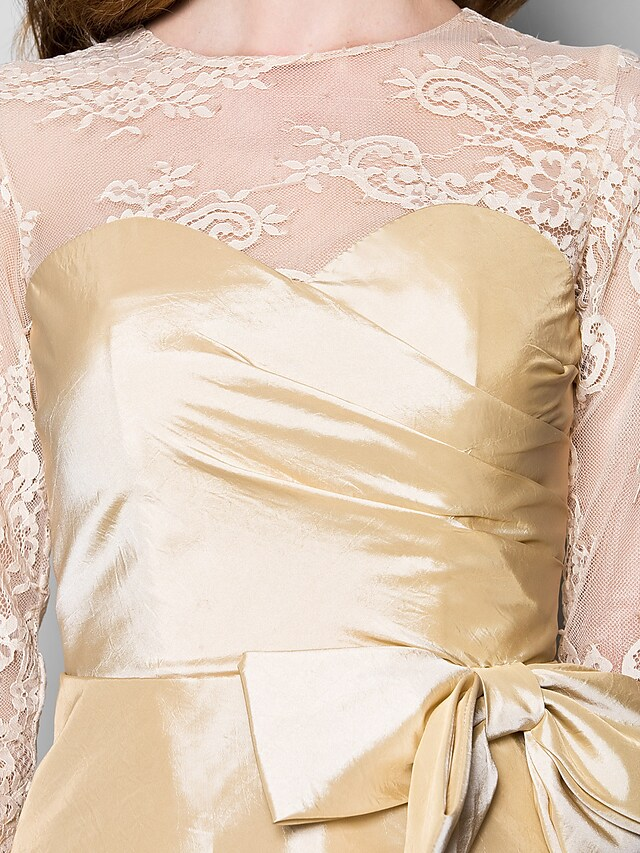 Model wearing the vintage-inspired Mother of the Bride dress.