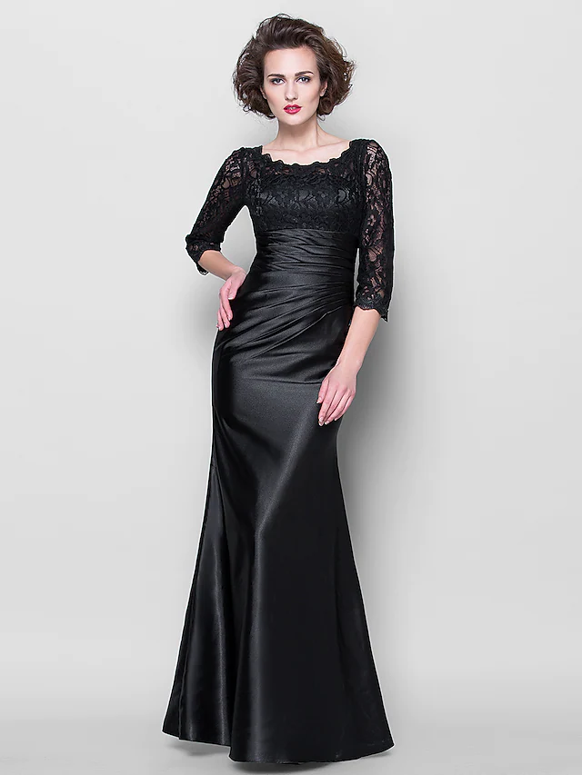 Side view of the floor-length lace and stretch satin dress.