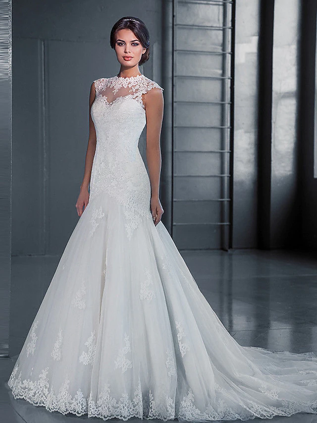 Elegant white mermaid wedding dress with jewel neck, lace appliques, and court train.