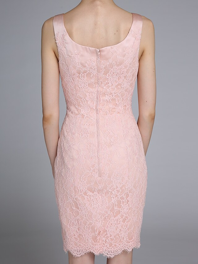 Mermaid style Mother of the Bride dress with a flowing train.