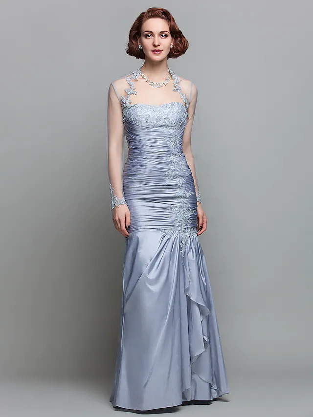 Elegant mermaid Mother of the Bride dress with strapless neckline and lace details, shown with matching wrap.