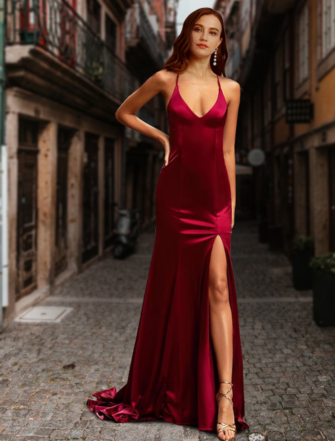 Woman wearing an elegant blue mermaid prom dress with a sweetheart neckline and backless detail.
