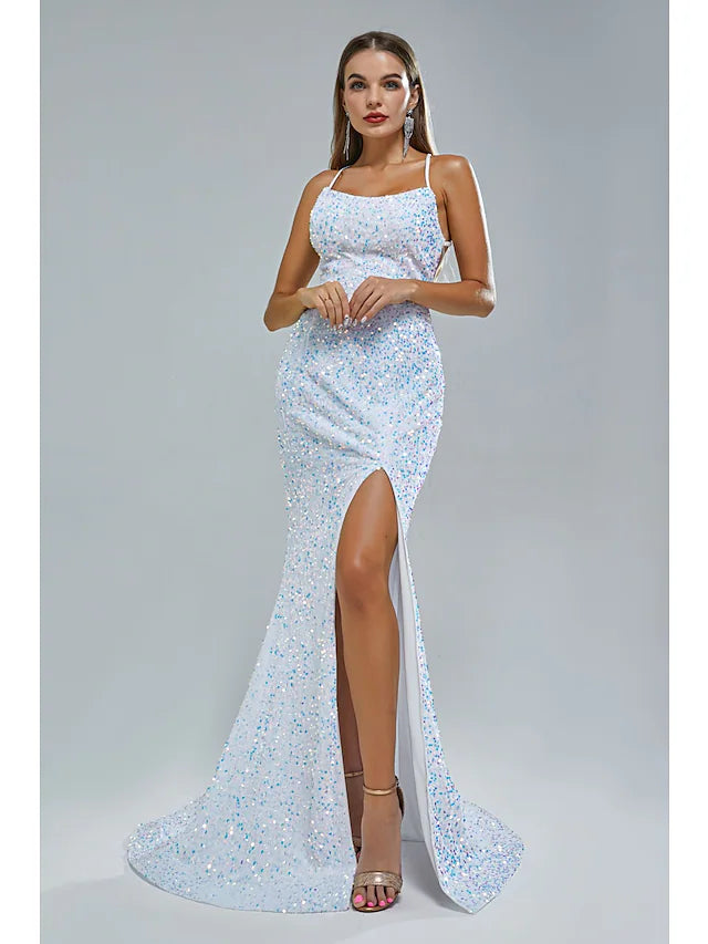 Elegant Mermaid Trumpet evening gown with spaghetti straps and sequin slit.