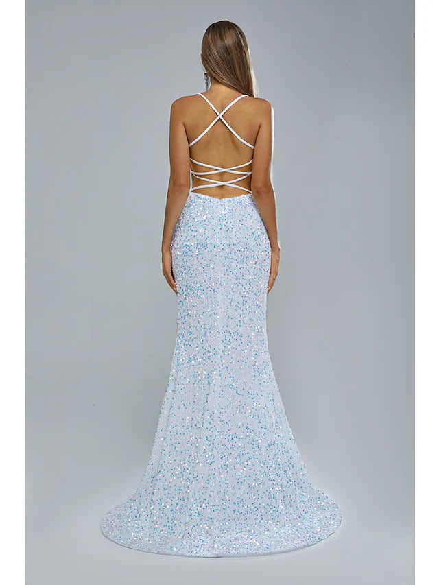 Close-up of delicate lace and sequin embellishments on the gown.