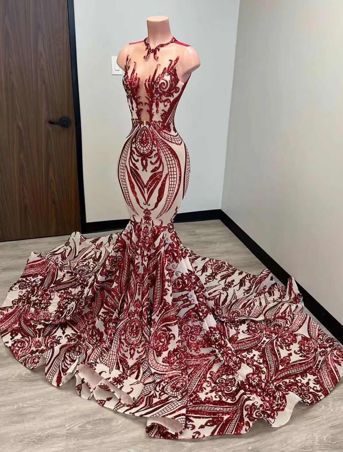 Back view of a mermaid trumpet evening gown showcasing the court train.