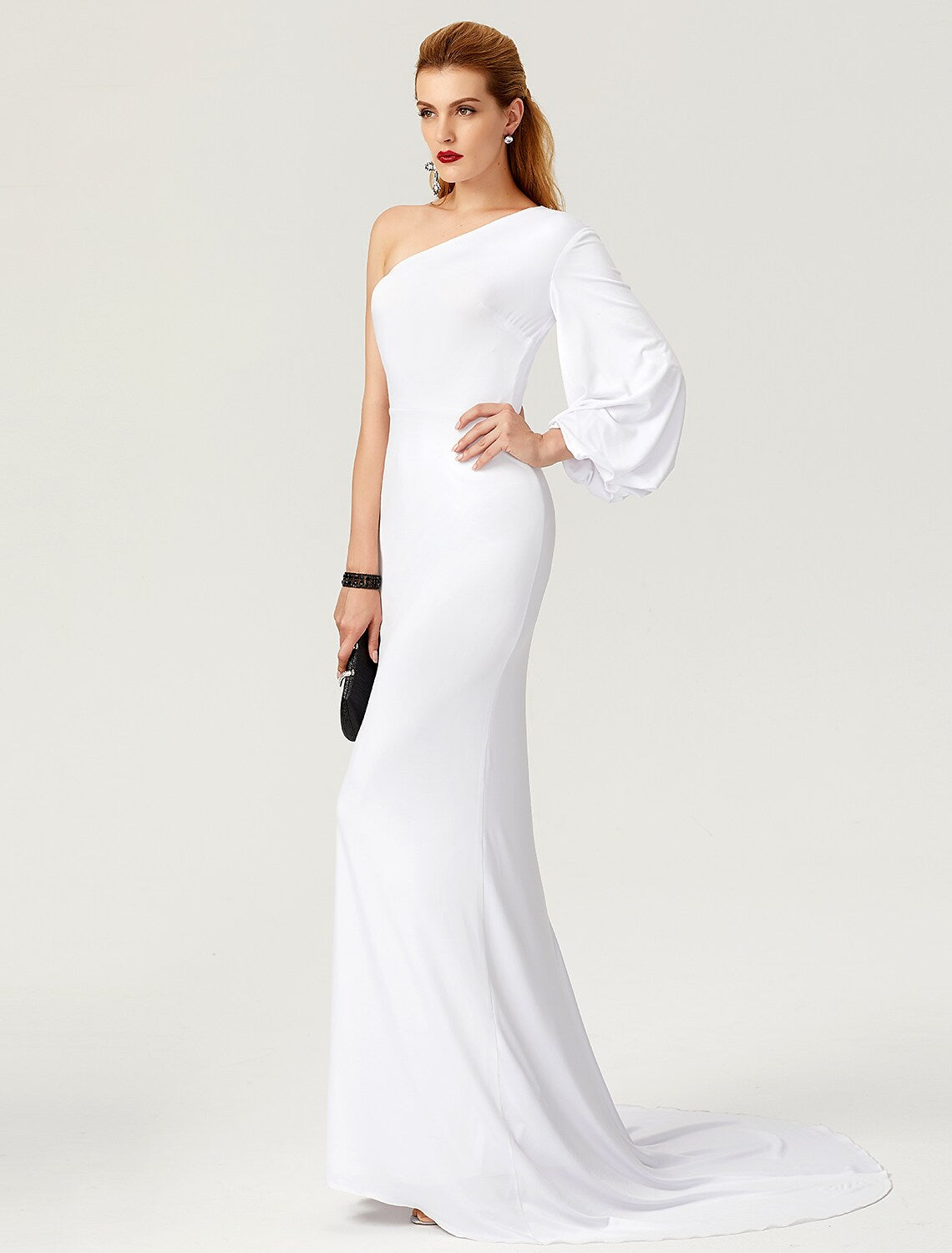 Side view of the elegant one-shoulder long-sleeve mermaid gown, highlighting the silhouette.