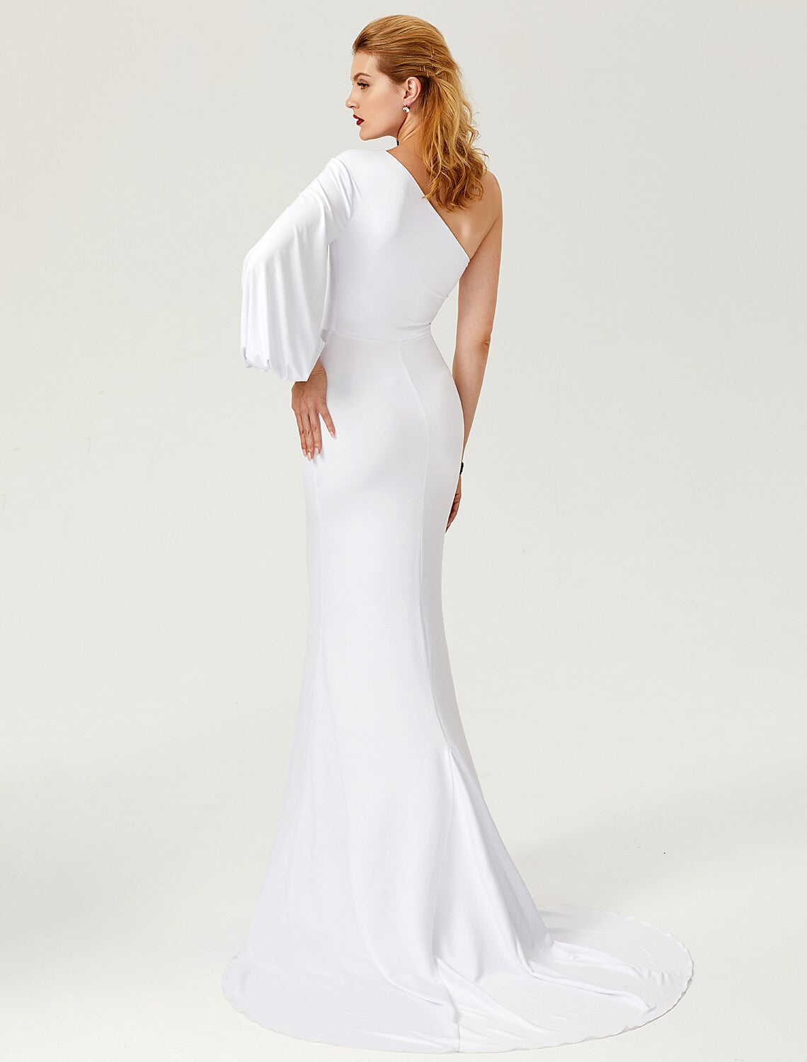 Full length view of the elegant one-shoulder long-sleeve mermaid gown.