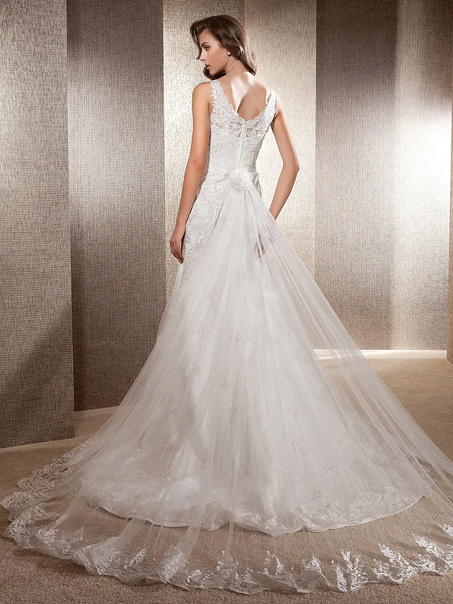 Back view of a mermaid trumpet wedding dress with sweep train.