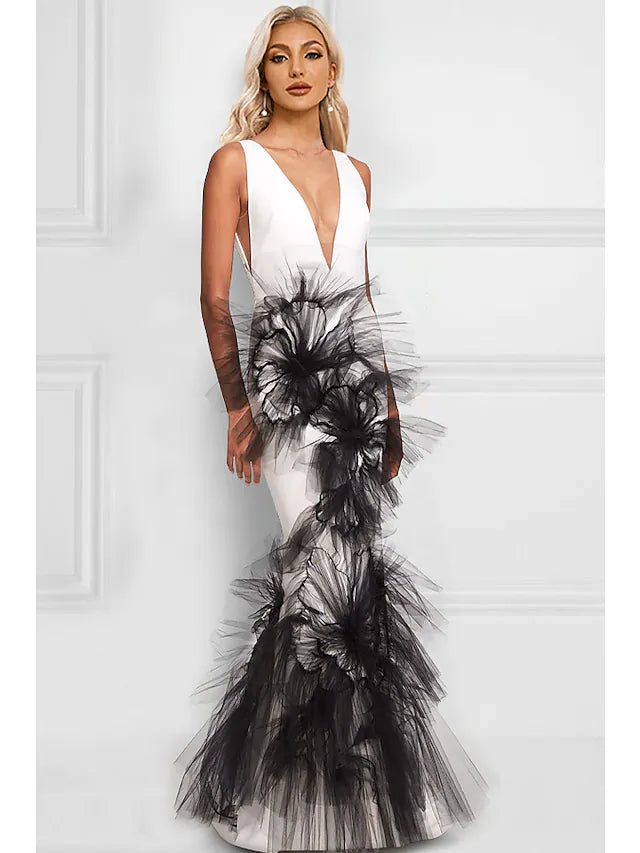 Elegant color block mermaid trumpet evening gown with V-neck and appliques.