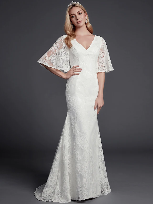 Elegant mermaid V-neck lace wedding dress, front view.