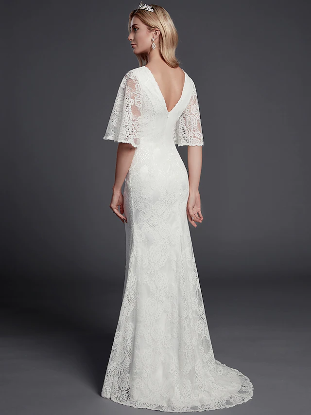 Side view of the mermaid wedding dress, showing half sleeves.