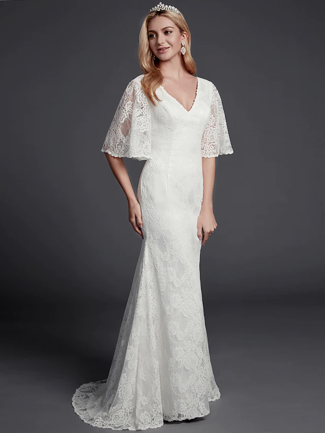 Close-up of the intricate lace details on the V-neck bodice.