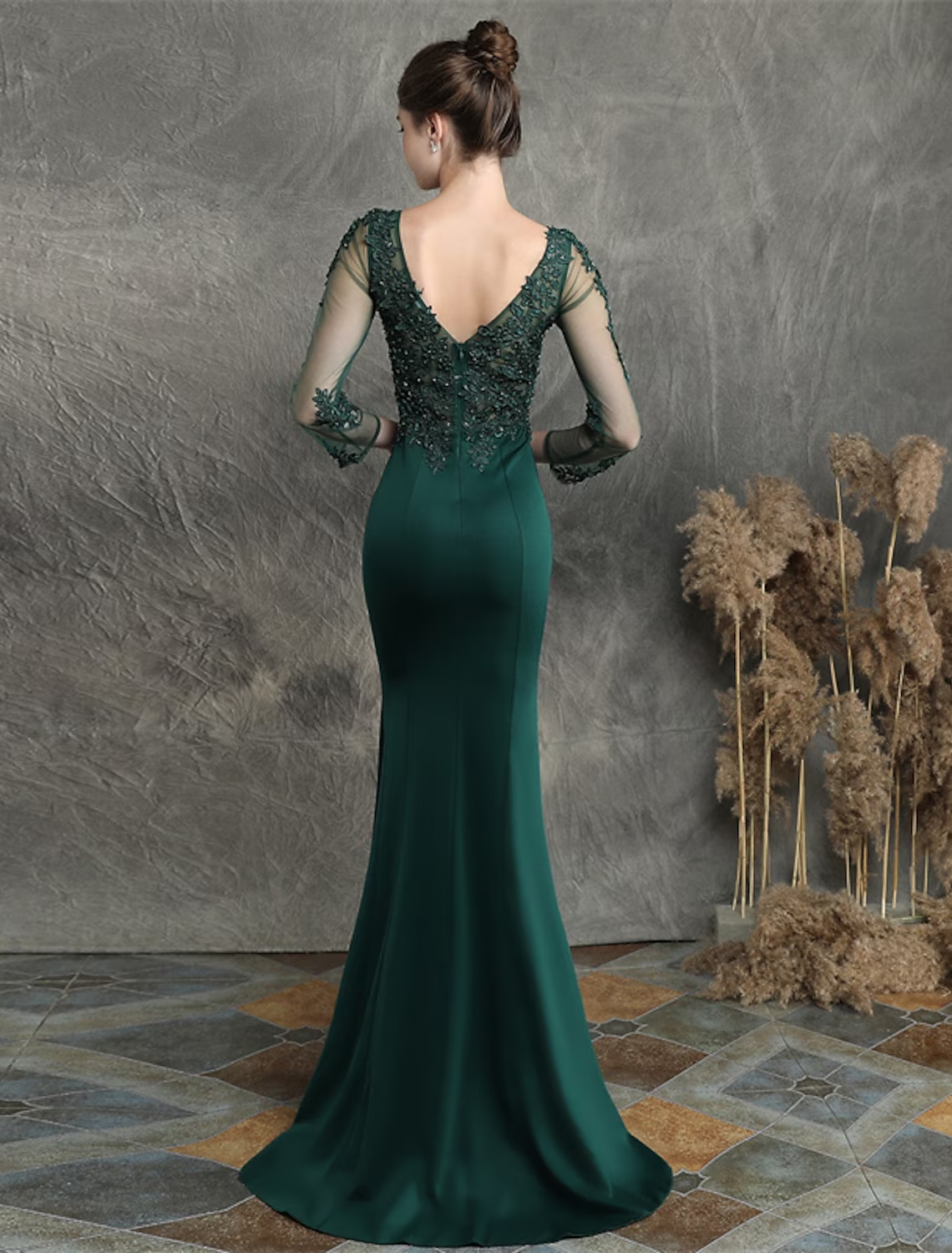 Full length view of the elegant mermaid prom dress, showcasing the V-neck, long sleeves, and sweep train.